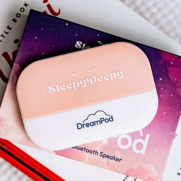 DreamPod Bluetooth speaker with 'Sleepy Deepy' branding on a colorful packaging