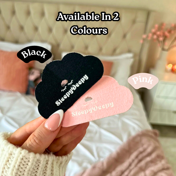 Black and pink cloud-shaped eye masks held by a hand with text indicating two color options.