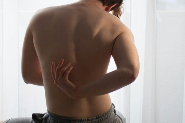 How to Sleep With Lower Back Pain: Positions and Fixes That Help