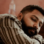 A man sleeping peacefully on his side in bed