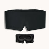 Black sleep mask and goggles on a white background