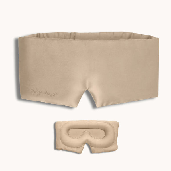 Beige sleep mask with strap on a white background