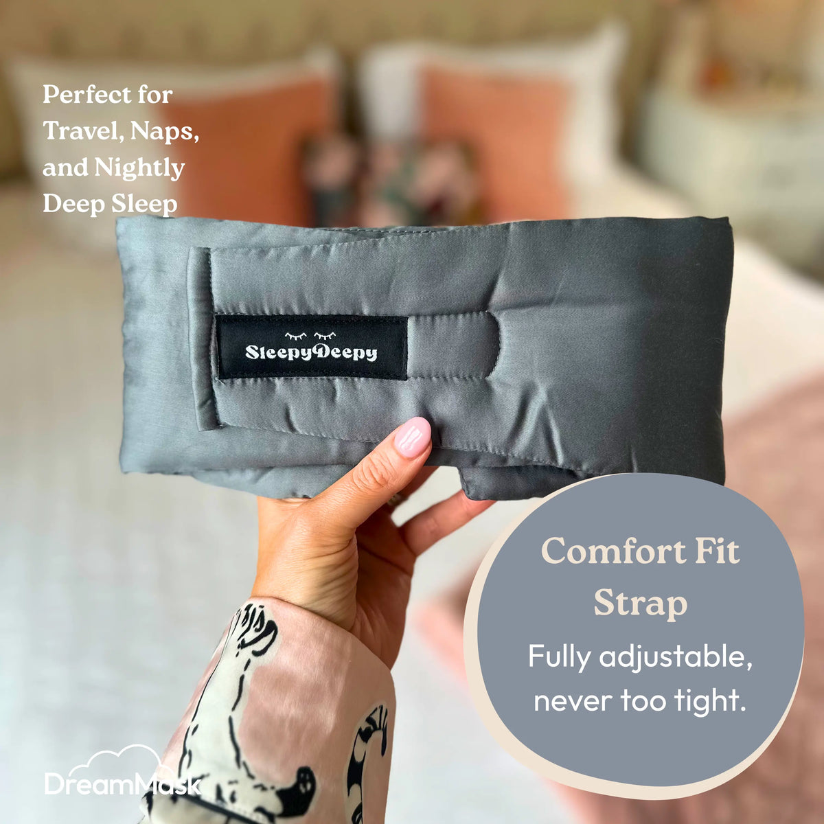 Gray sleep mask held by a hand with text about its use and features, set against a blurred bedroom background.